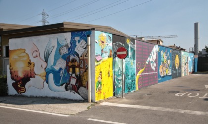 Giovani street artist riqualificano il muro del parcheggio dell’azienda IeO di Merate