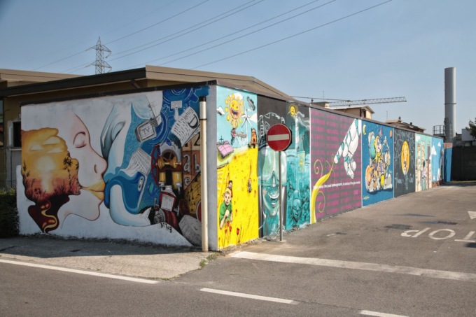 Giovani street artist riqualificano il muro del parcheggio dell’azienda IeO di Merate